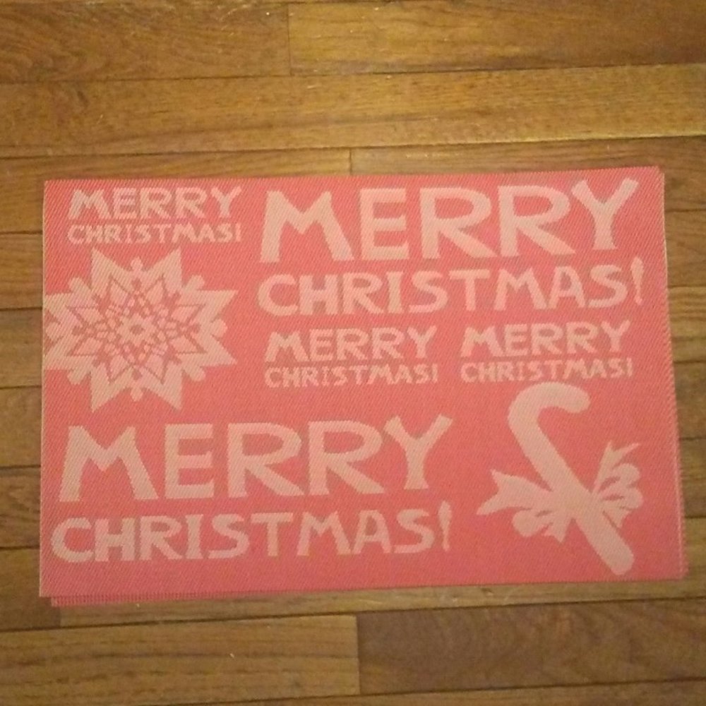 Set of Christmas vinyl place mats - 6 total